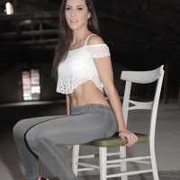 Brunette Euro babe Carolina Abril shedding yoga pants to pose for nude pics