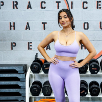 Curvy dark haired bitch Roxie Sinner getting down and dirty in the gym