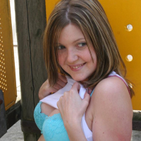 Pictures of teen model Madison Summers teasing at a park