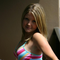 Pictures of Madison Summers teasing your cock in the back yard