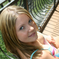 Pictures of Madison Summers teasing your cock in the back yard
