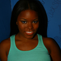 Ebony Candice Nicole sucks a white cock thru the gloryhole