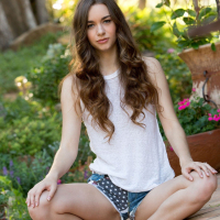 Tantalising Tali Dova takes down her denim Shorts