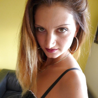 Nylon and lingerie attired European amateur Eva Johnson baring bald cunt