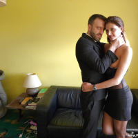 Nylon and lingerie attired European amateur Eva Johnson baring bald cunt