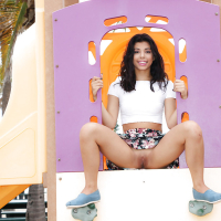 Solo girl Gina Valentina flashing shaved upskirt pussy outdoors