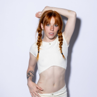 Lustful redhead vixen Madi Collins moans while masturbating her pussy