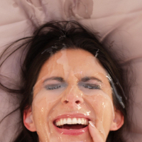 Brunette girl Nikki Daniels gets cum all over her face