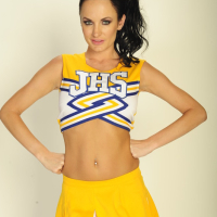 Busty babe Alektra Blue takes off cheerleader uniform to show pussy