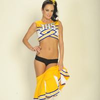 Busty babe Alektra Blue takes off cheerleader uniform to show pussy