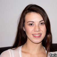 Young brunette vixen Tiffany Doll gets her face covered in stycky jizzload