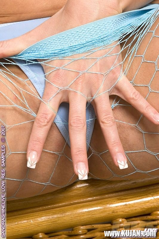 Sandra Shine strips fishnets for blue dildo - Photo #1110760