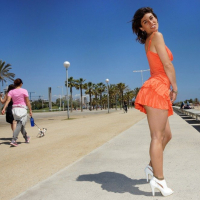 Julia Roca flashing her bum and tits on the beach
