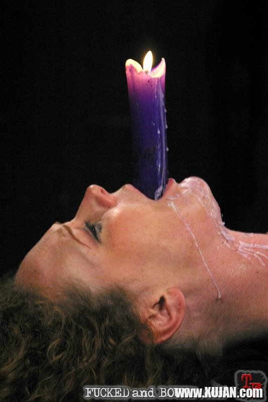 Bound Audrey Hollander gets a candle in her ass with fucking - Photo #1118458