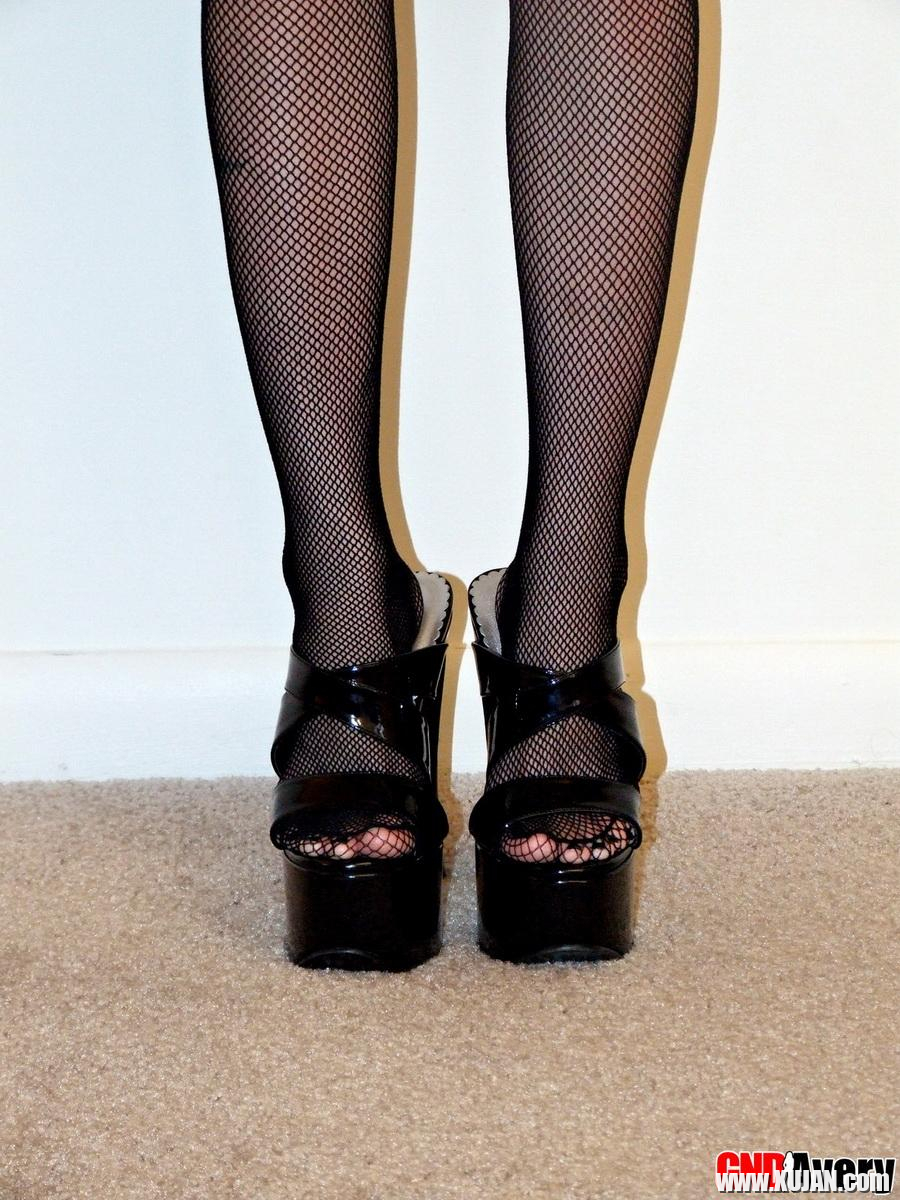 Avery spreads her ass and pussy for the camera wearing black fishnet stockings - Photo #1121036