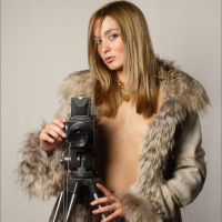 Luscious Russian teen Sweet Lilya posing in her coat