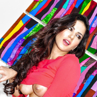 Big tits pornstar milf Sunny Leone is revealing her perfect hairy pussy