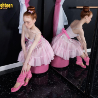 Redhead dancer Dolly Little strips naked for you in the studio
