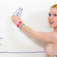 Redhead teen Dolly Little has some naked fun