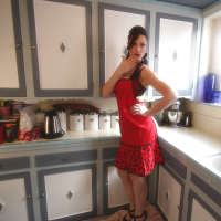 MILF pornstar Lana Kendrick exposing big knockers and nipples for oiling