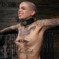 Inked Slut Leigh Raven gets tied up in the Dungeon