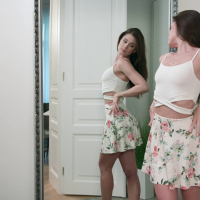 Little Caprice checks herself out in the mirror