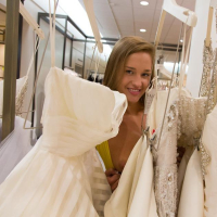 Hot coed April Brookes gives you some peeks up her skirt at a public mall