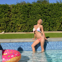 Busty hottie Birana Lee strips in her bikini outside