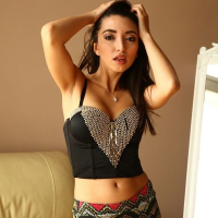 Frida Sante busty latina milf poses naked