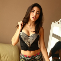 Frida Sante busty latina milf poses naked