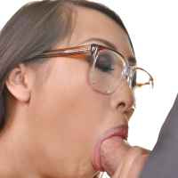 Glasses clad Asian Sharon Lee giving older white man a blowjob