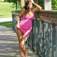 Pictures of teen girl London Hart teasing in a pink dress