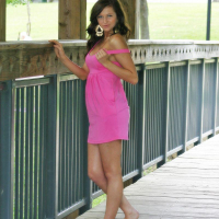 Pictures of teen girl London Hart teasing in a pink dress