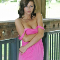 Pictures of teen girl London Hart teasing in a pink dress