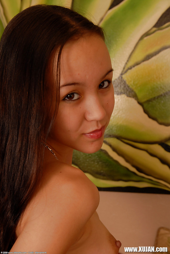 Barely legal Asian spinner Amai Liu posing fully clothed before stripping - Photo #1203467