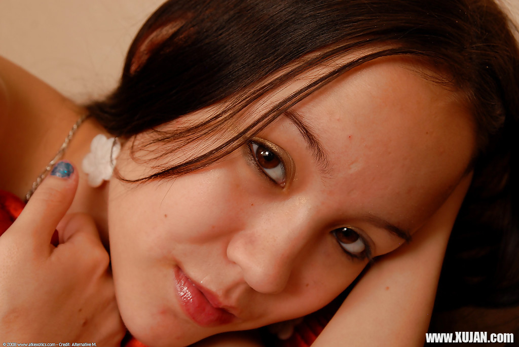 Barely legal Asian spinner Amai Liu posing fully clothed before stripping - Photo #1203474