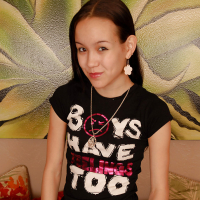 Barely legal Asian spinner Amai Liu posing fully clothed before stripping