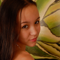 Barely legal Asian spinner Amai Liu posing fully clothed before stripping