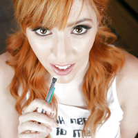 Busty girl with red hair Lauren Phillips spreading hairy vagina in office