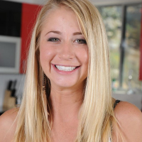 Spunky coed Casi James strips naked on the counter