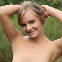 Lucette Nice slides a long Finger in her wet Pussy