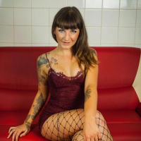 Adreena Winters showing her Ass wearing Fishnets