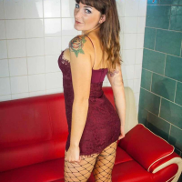 Adreena Winters showing her Ass wearing Fishnets