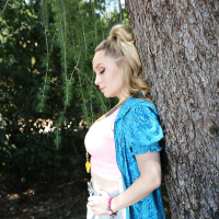 Slutty blonde chick Aiden Starr sucking dick inside wheelbarrow in woods