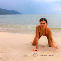 Julia V Earth in red bikini at the beach