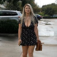 Thick bombshell in sexy dress Emily Right flaunts her big jugs and panties