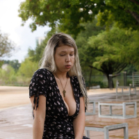 Thick bombshell in sexy dress Emily Right flaunts her big jugs and panties