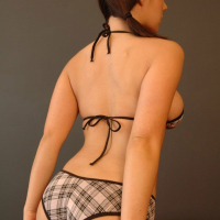 Sweet Krissy shows her Ass and big Knockers