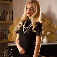 Blonde teeb pornstar Alex Grey stripping down to nylons for glamour spread