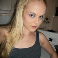 Amateur petite blonde Bri Skies gets naked in the kitchen